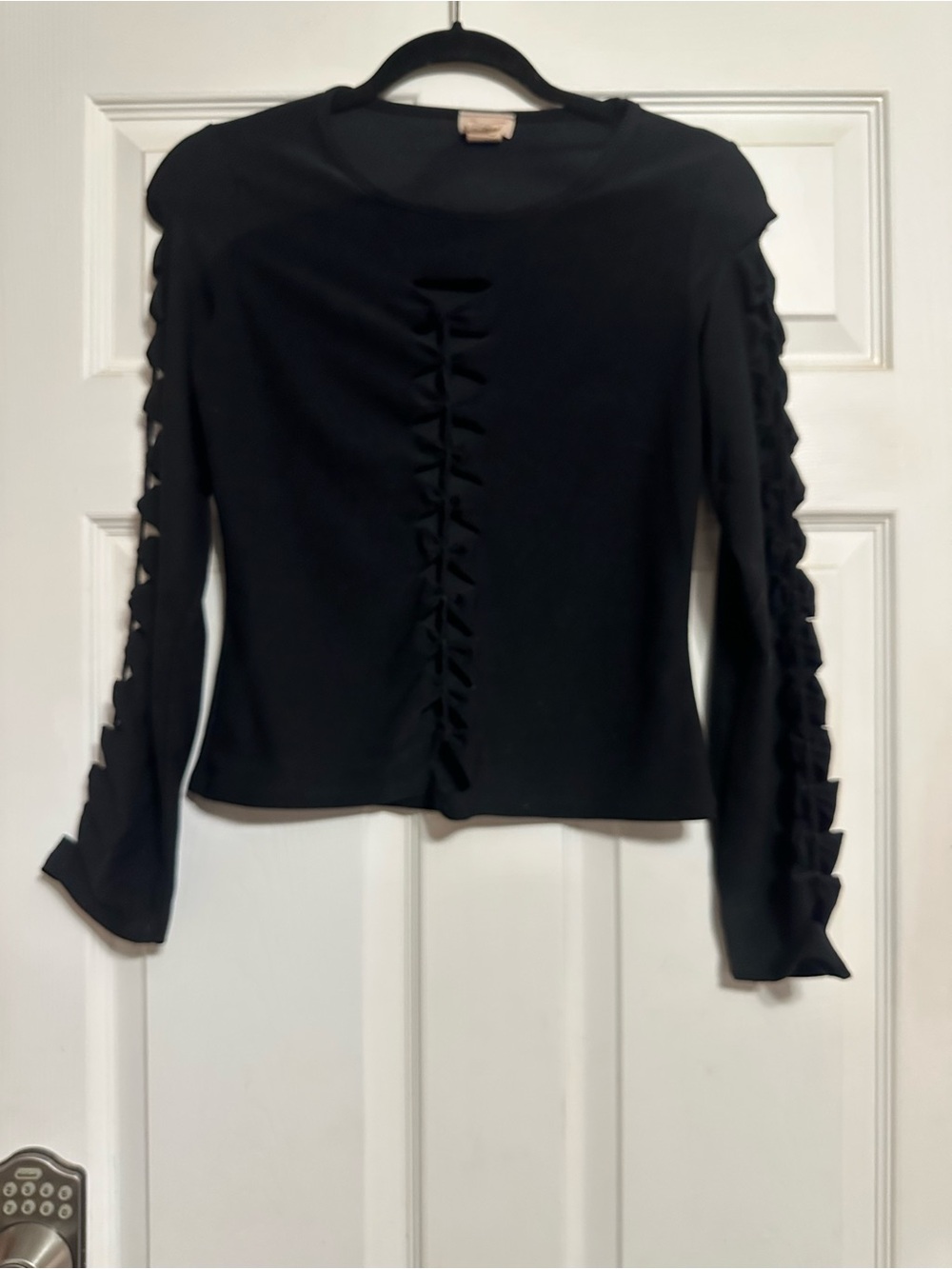 Biker shirt. Black Women’s Long Sleeve hole Accents down middle and sleeves Top